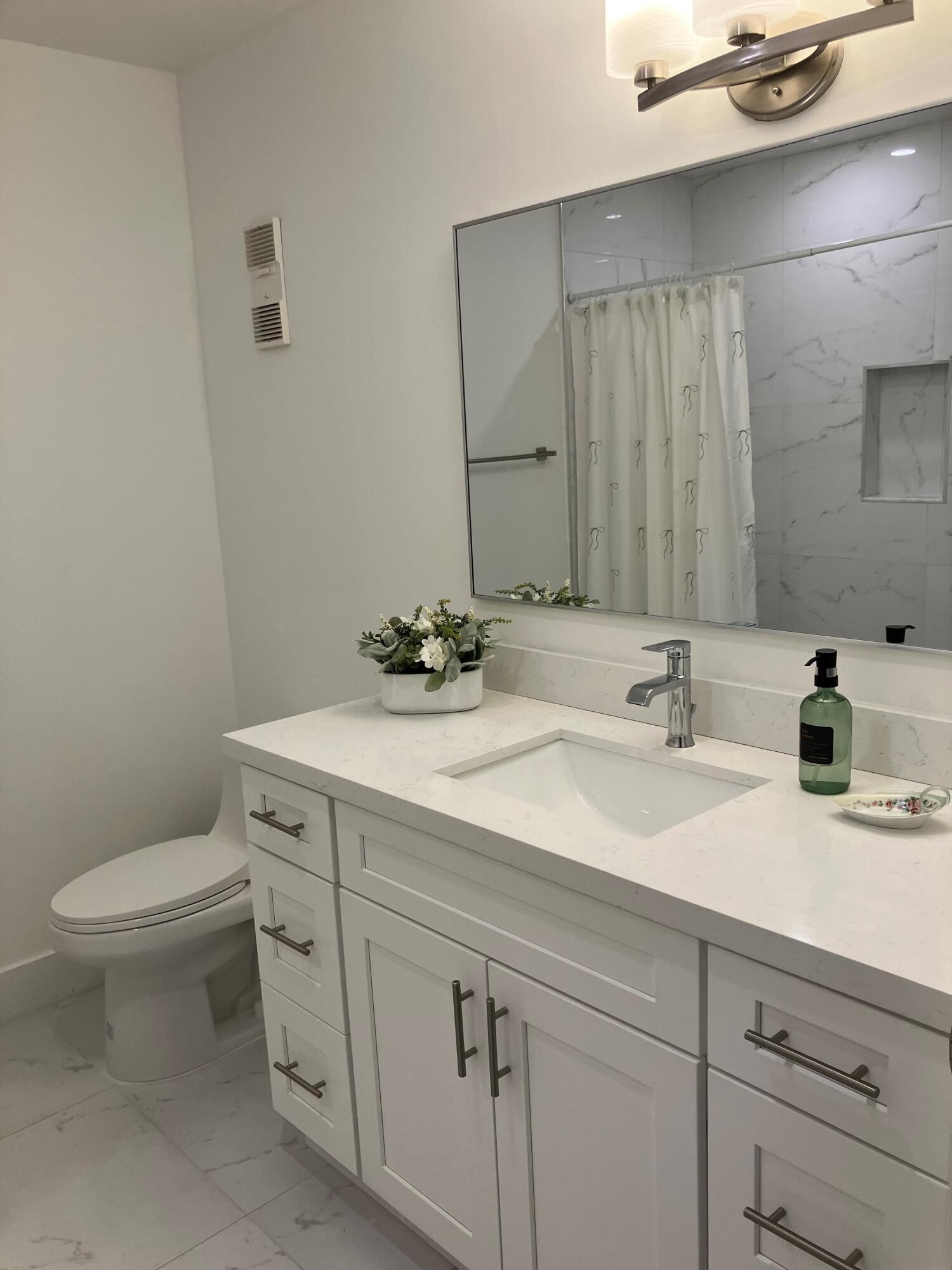 8273 Springtree Road Boca Raton, FL 33496 - Photo 8 of 37 Eastgate small bathroom 1
