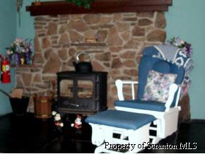7 Indian Spring Road Tunkhannock, PA 18657 - Photo 4 of 4 a living room with a fireplace