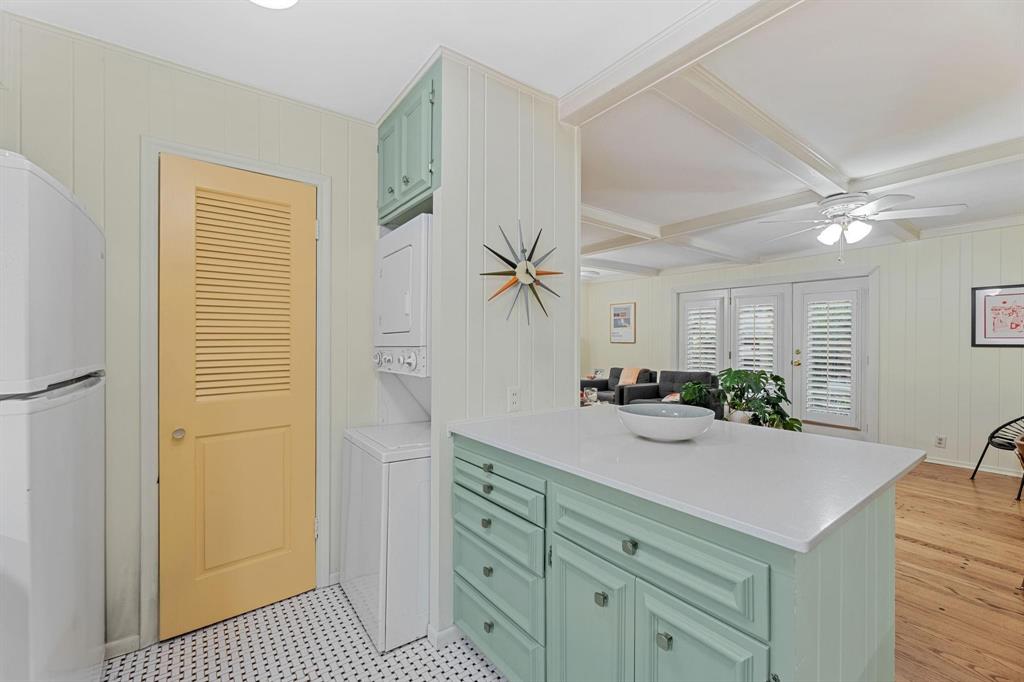 6135 Bandera Avenue, Unit A Dallas, TX 75225 - Photo 12 of 24 a view of a kitchen cabinets a sink and a refrigerator