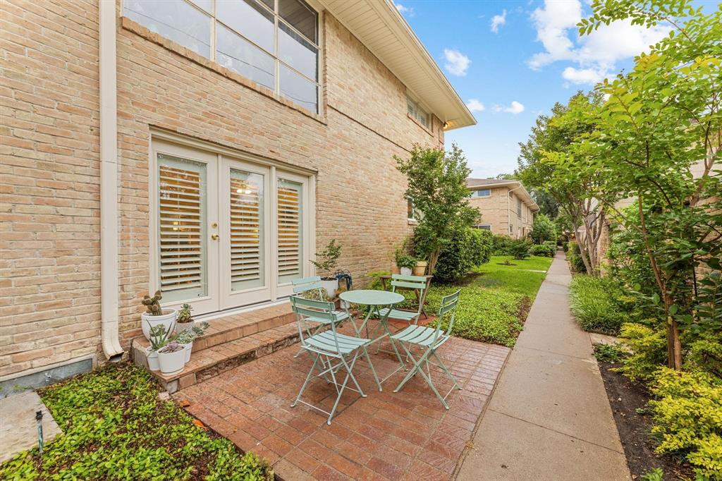 6135 Bandera Avenue, Unit A Dallas, TX 75225 - Photo 21 of 24 a backyard of a house with outdoor seating