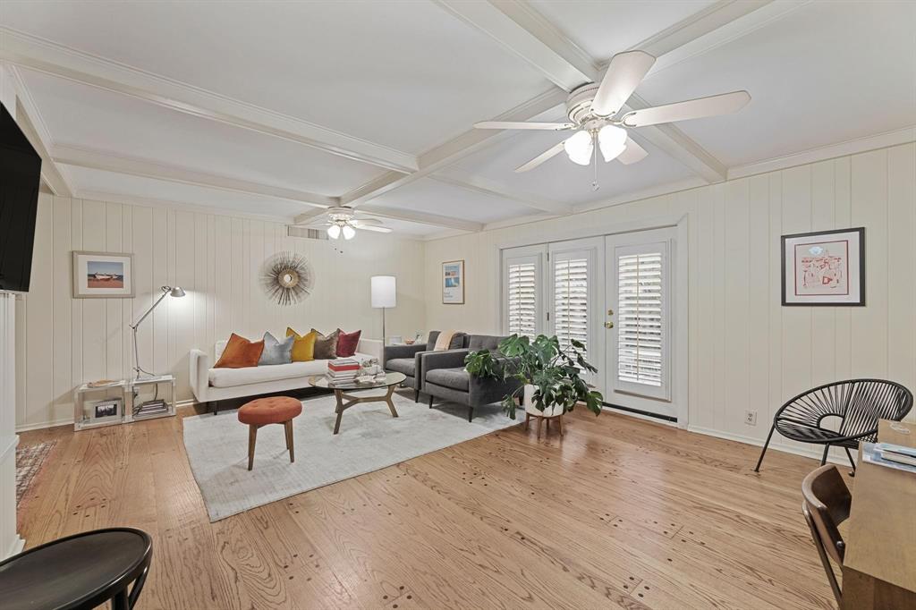 6135 Bandera Avenue, Unit A Dallas, TX 75225 - Photo 8 of 24 a living room with furniture and wooden floor