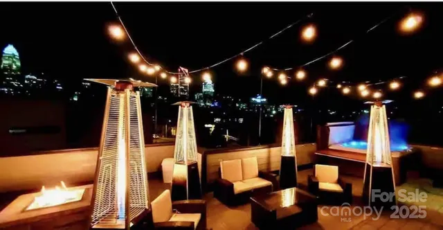 a view of a lobby with furniture and lamp