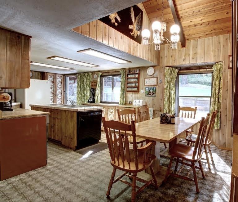 10548 Wagner Creek Road Talent, OR 97540 - Photo 25 of 31 a view of a dining room with furniture window and wooden floor