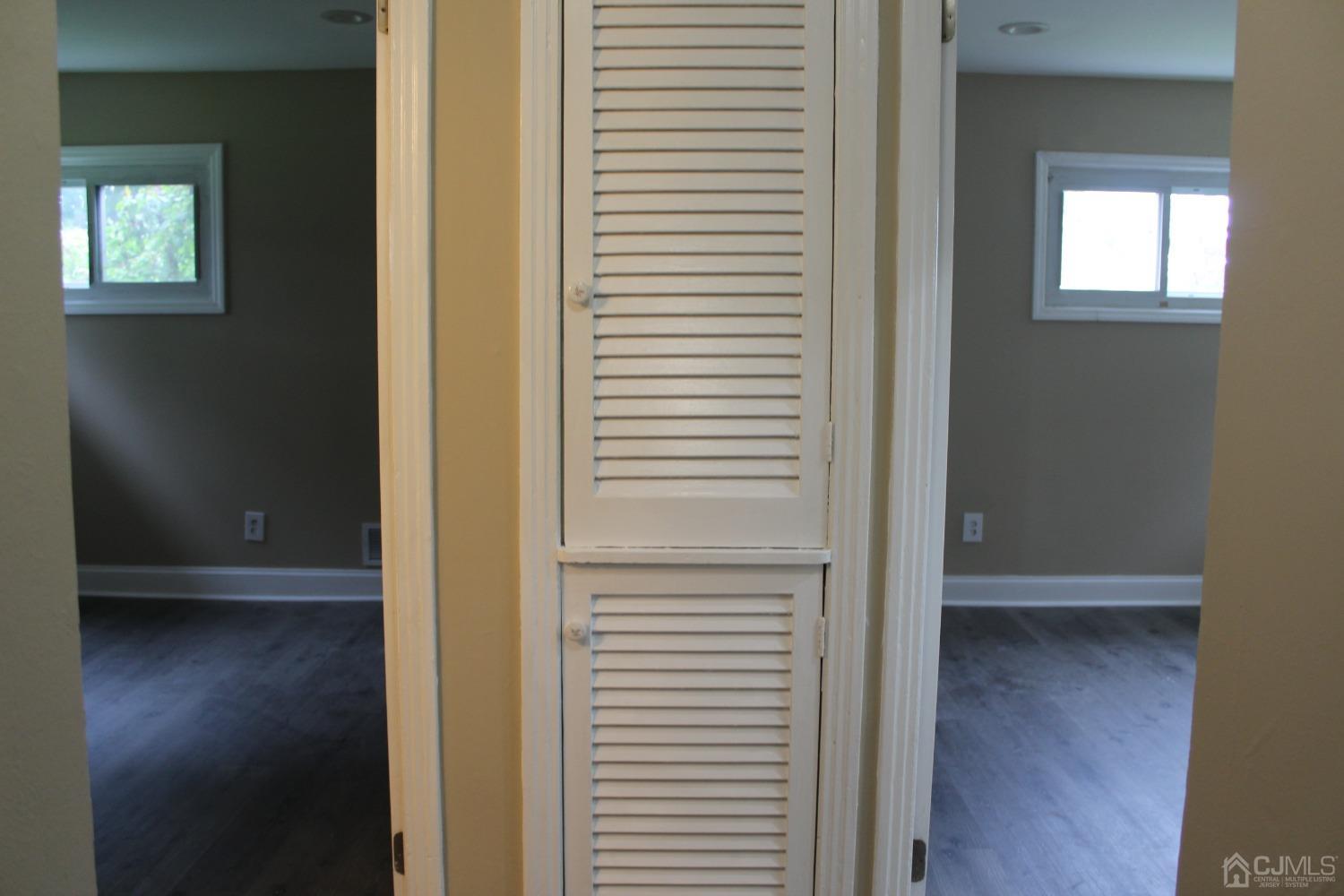 27 Markham Road Edison, NJ 08817 - Photo 16 of 28 an empty room with wooden floor