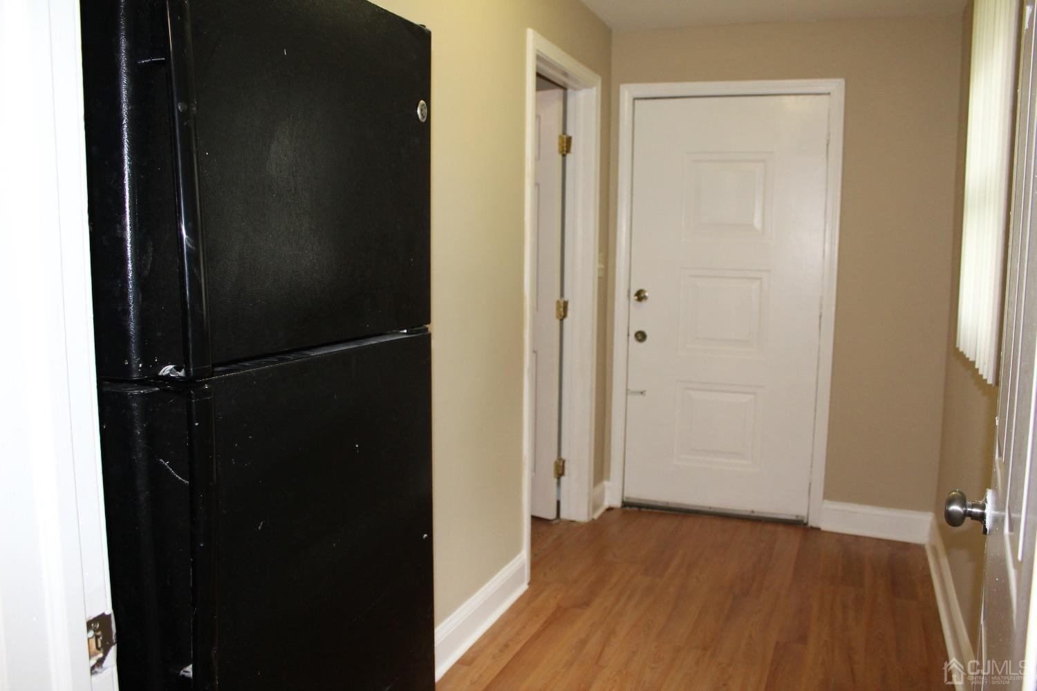27 Markham Road Edison, NJ 08817 - Photo 19 of 28 a view of a bathroom with wooden floor