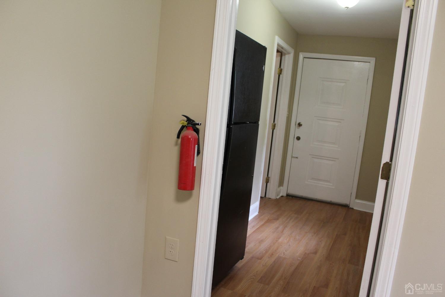 27 Markham Road Edison, NJ 08817 - Photo 23 of 28 an entryway with wooden floor