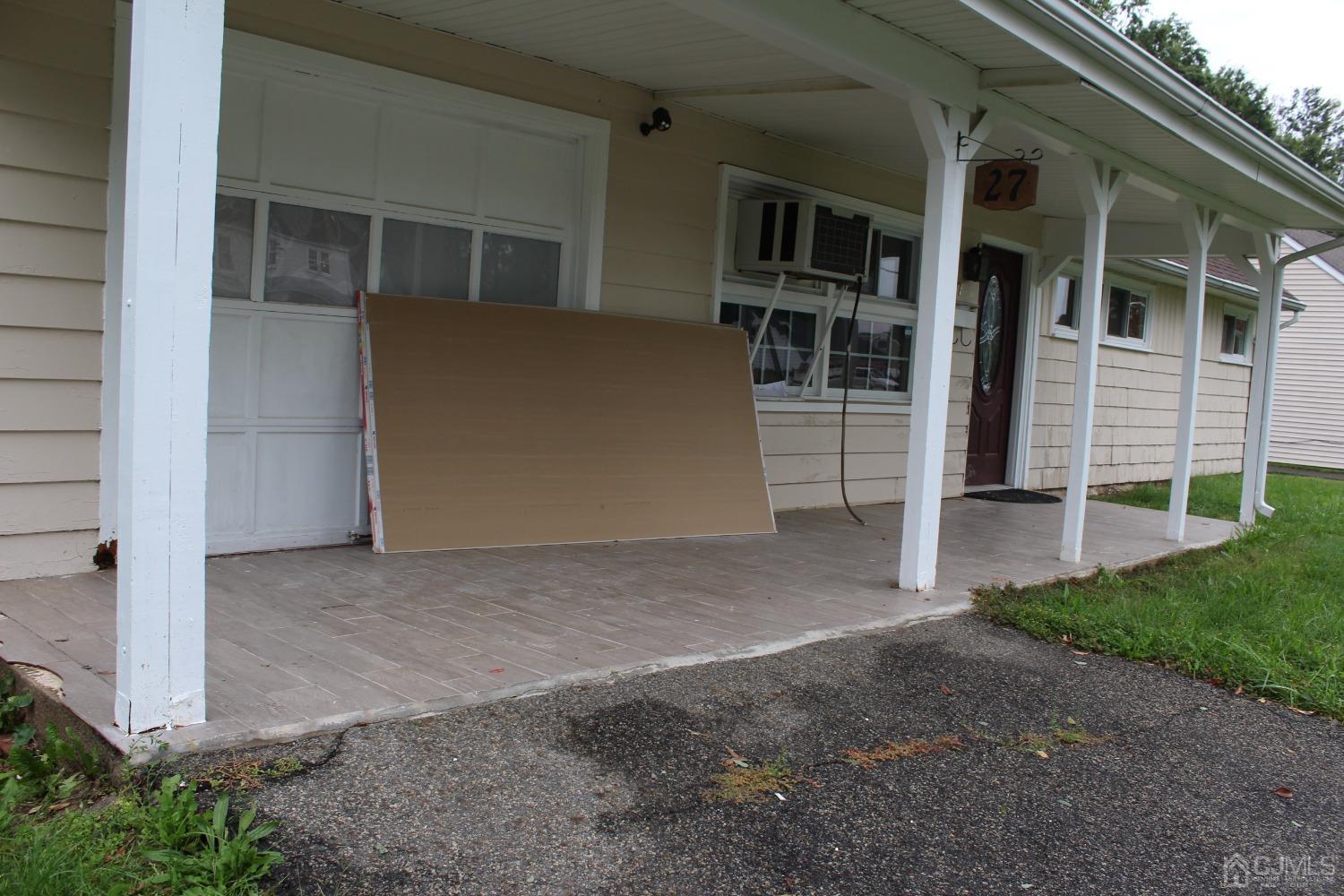27 Markham Road Edison, NJ 08817 - Photo 25 of 28 a view of a house with an empty space