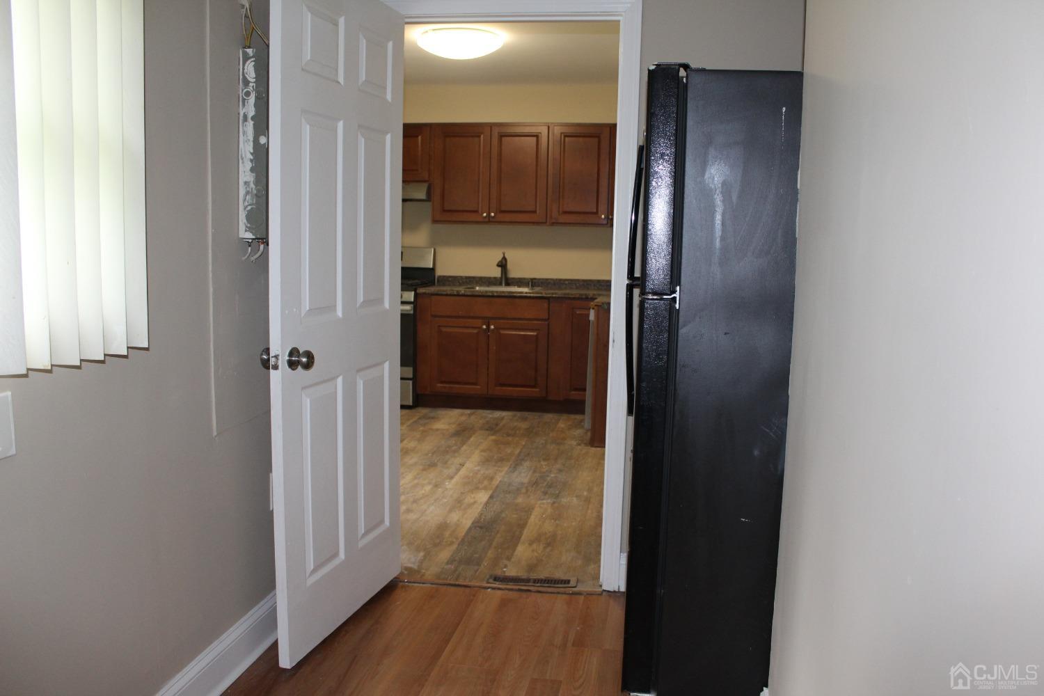 27 Markham Road Edison, NJ 08817 - Photo 5 of 28 a bathroom with a granite countertop sink and shower
