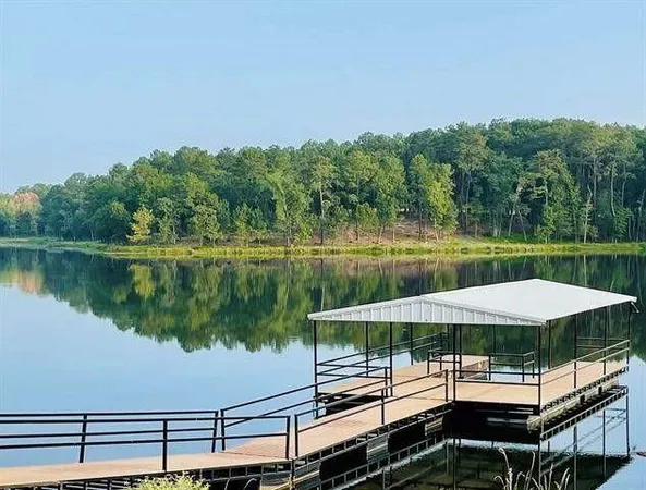 a view of a lake with a big yard