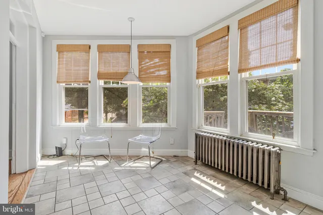 a view of a room with windows