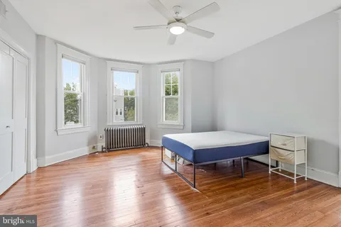 a living room with a window furniture and a window