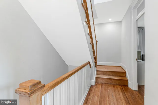 a view of entryway with wooden floor