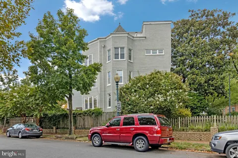 a car parked in front of a house