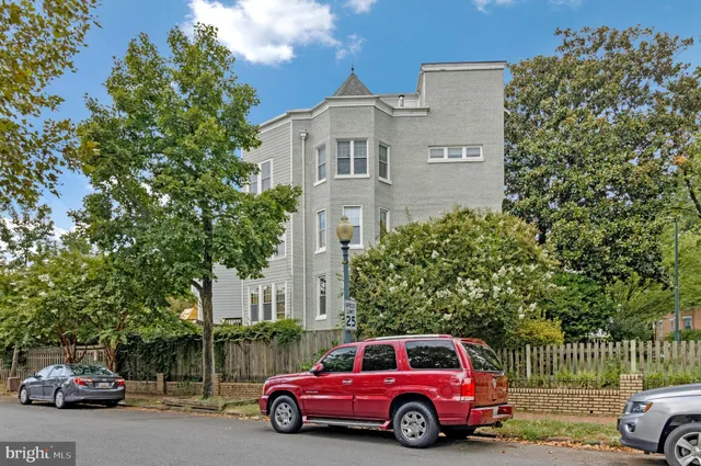 a car parked in front of a house