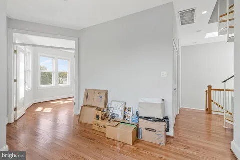 a view of an empty room and window