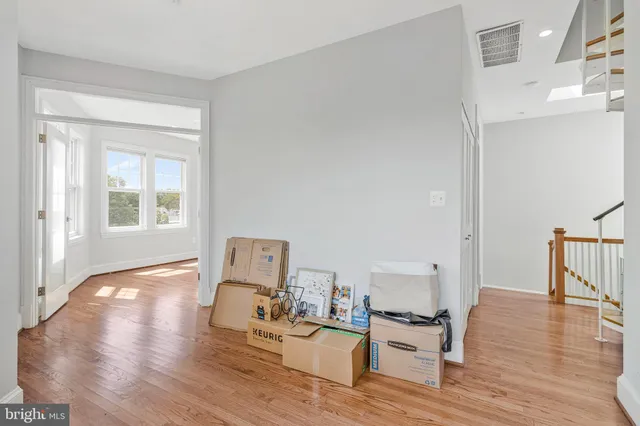 a view of an empty room and window