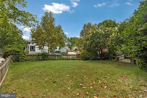 a view of a large building with a garden