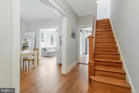 a view of a living room and dining room