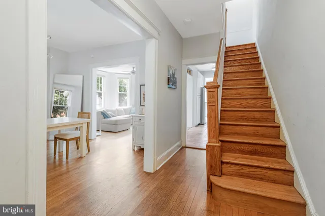 a view of a living room and dining room