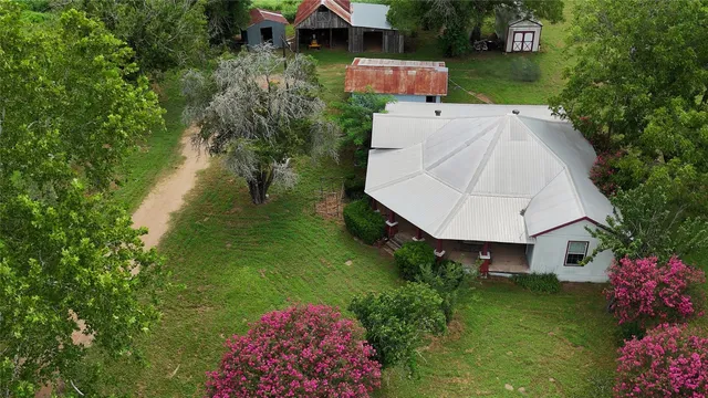 a view of a yard with an outdoor space