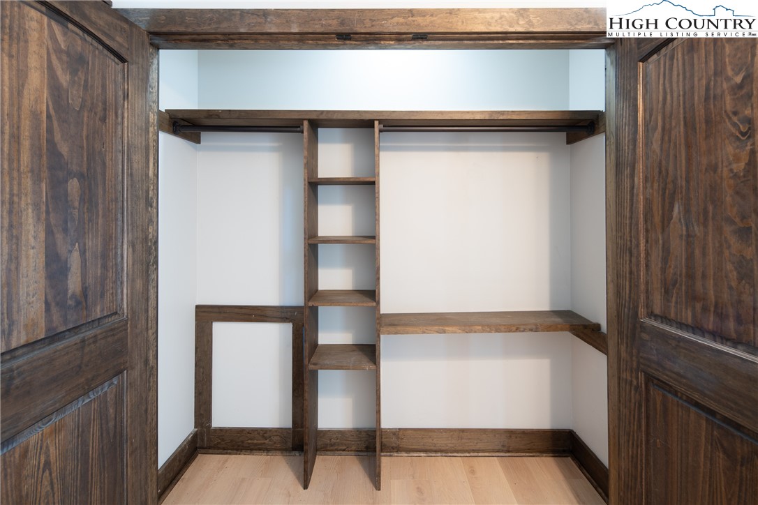 264 Foggy Lane Boone, NC 28607 - Photo 12 of 32 a view of walk in closet with empty racks