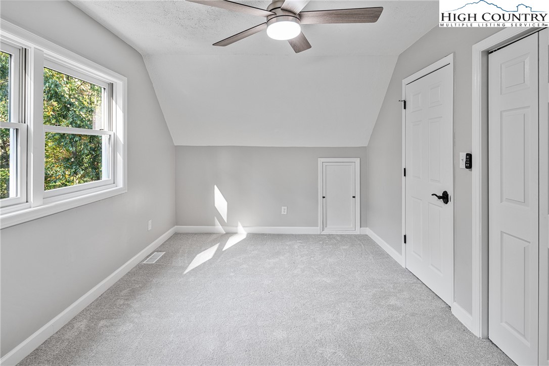 264 Foggy Lane Boone, NC 28607 - Photo 18 of 32 a view of an empty room with a window
