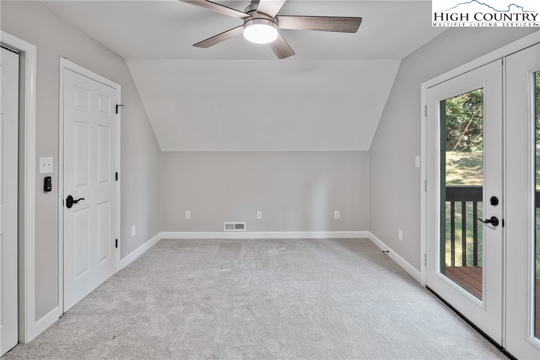 264 Foggy Lane Boone, NC 28607 - Photo 20 of 32 a view of an empty room with a window