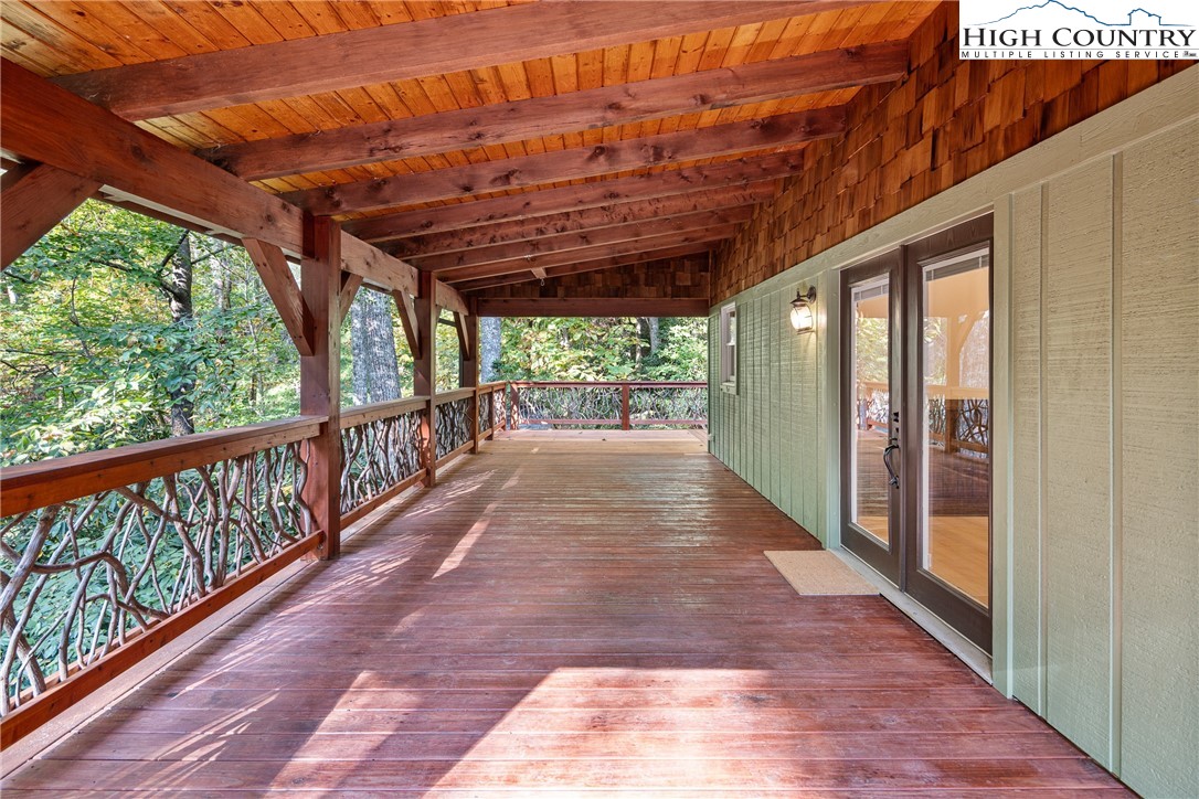 264 Foggy Lane Boone, NC 28607 - Photo 22 of 32 a view of porch with wooden floor