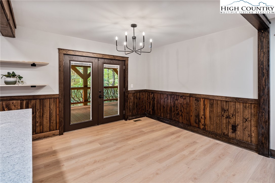 264 Foggy Lane Boone, NC 28607 - Photo 9 of 32 a view of empty room with wooden floor