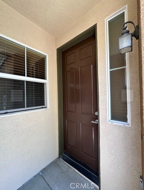 8692 East 9th Street, Unit 56 Rancho Cucamonga, CA 91730 - Photo 4 of 34 a view of front door