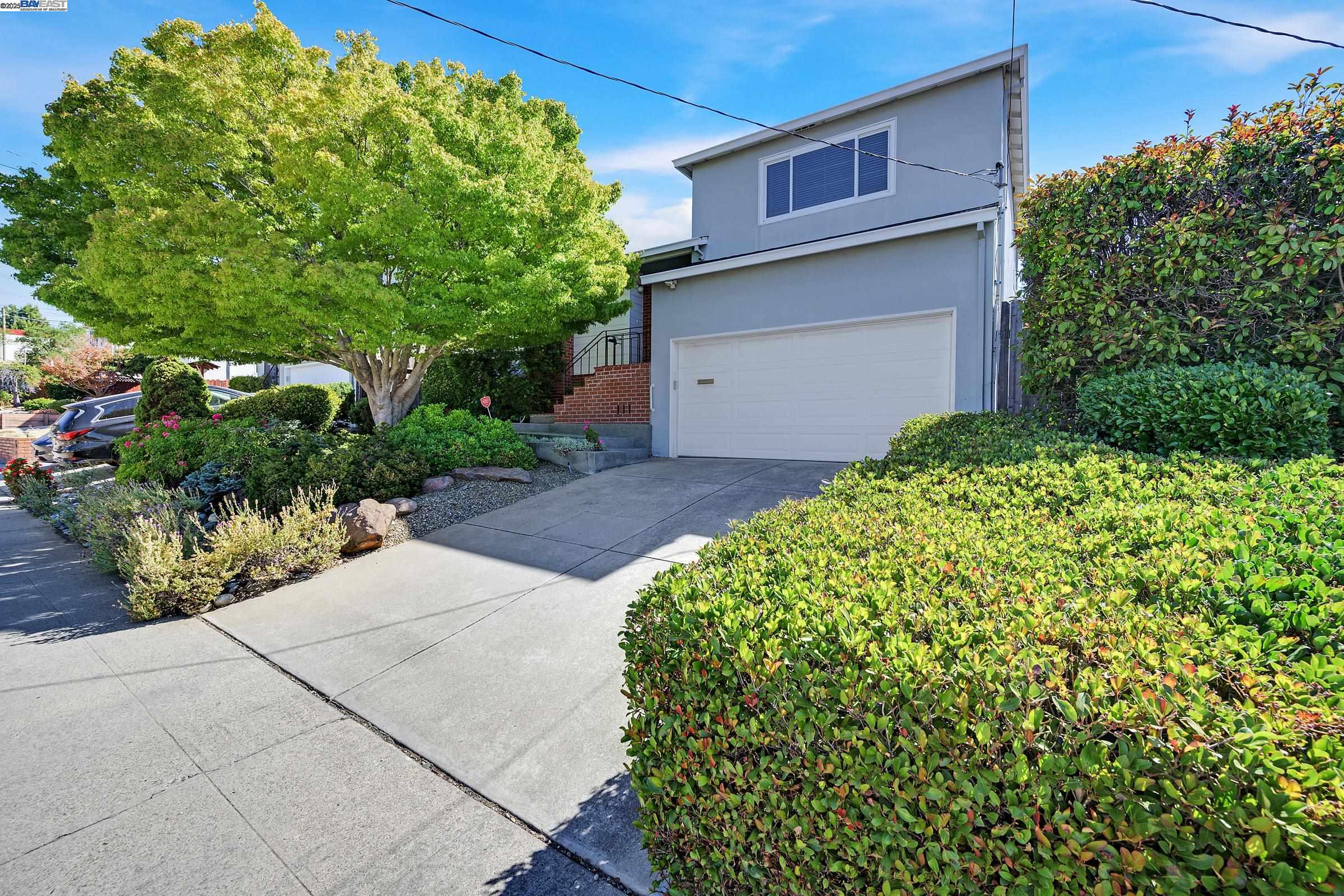 a backyard of a house with lots of green space