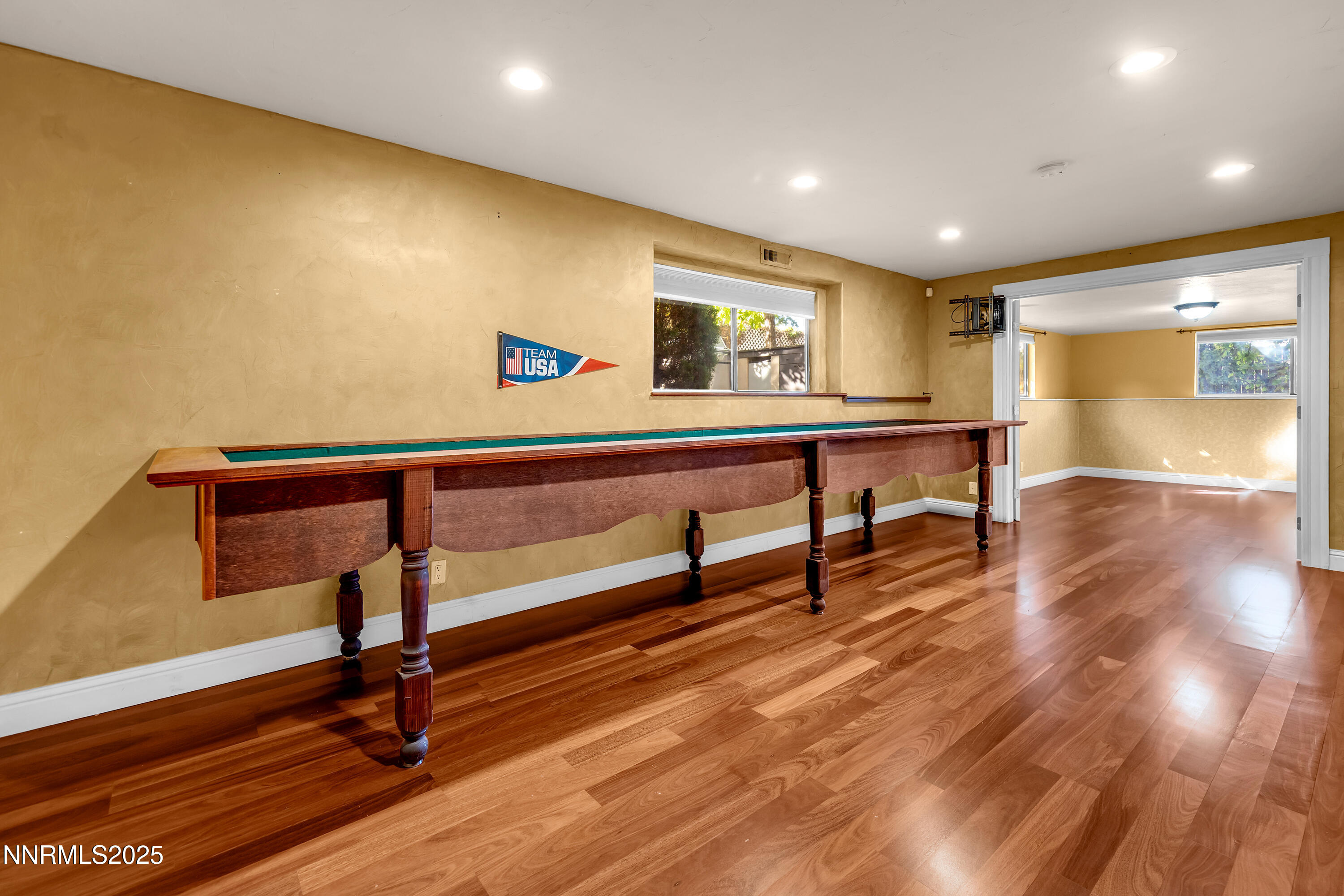 2835 Parkway Drive Reno, NV 89502 - Photo 16 of 39 a view of a room with wooden floor and windows