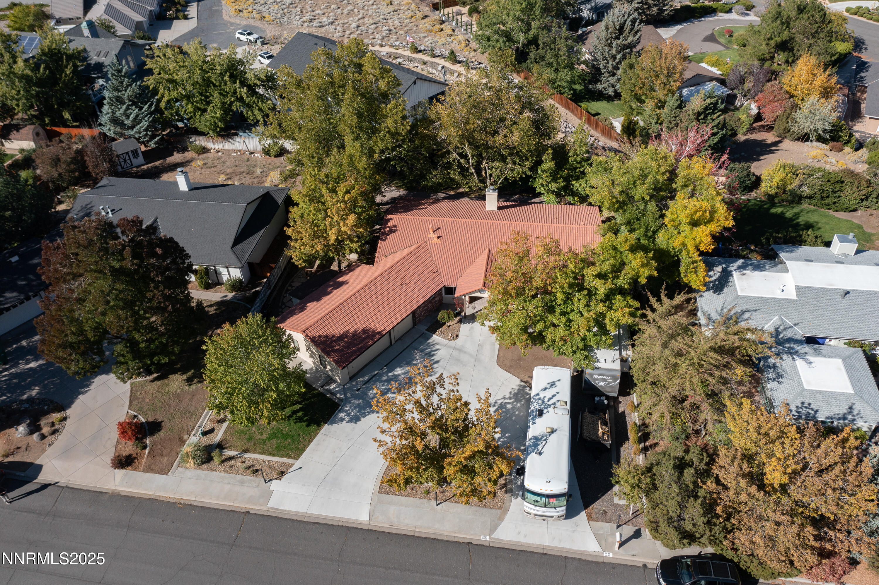2835 Parkway Drive Reno, NV 89502 - Photo 35 of 39 an aerial view of a house with a yard and mountain view