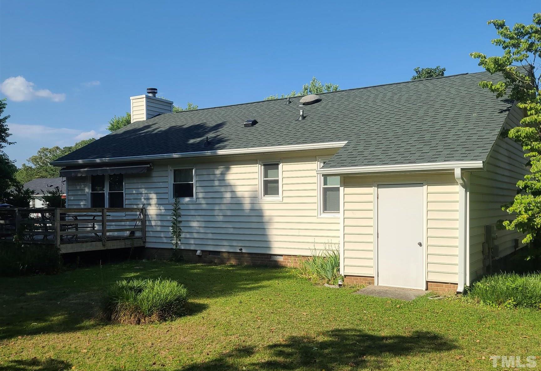 13125 Callens Lane Willow Spring, NC 27592 - Photo 2 of 13 a front view of a house with a yard