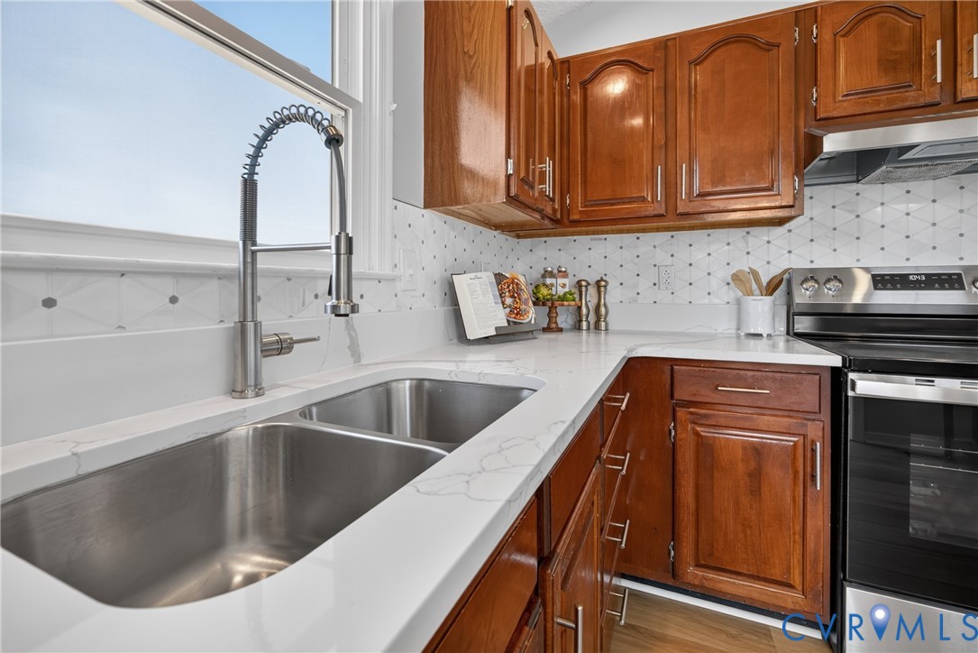 1559 Tree Ridge Road Henrico, VA 23231 - Photo 17 of 40 Kitchen featuring a double basin stainless steel s