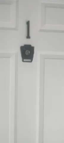 a close view of a utility room with dryer and washer