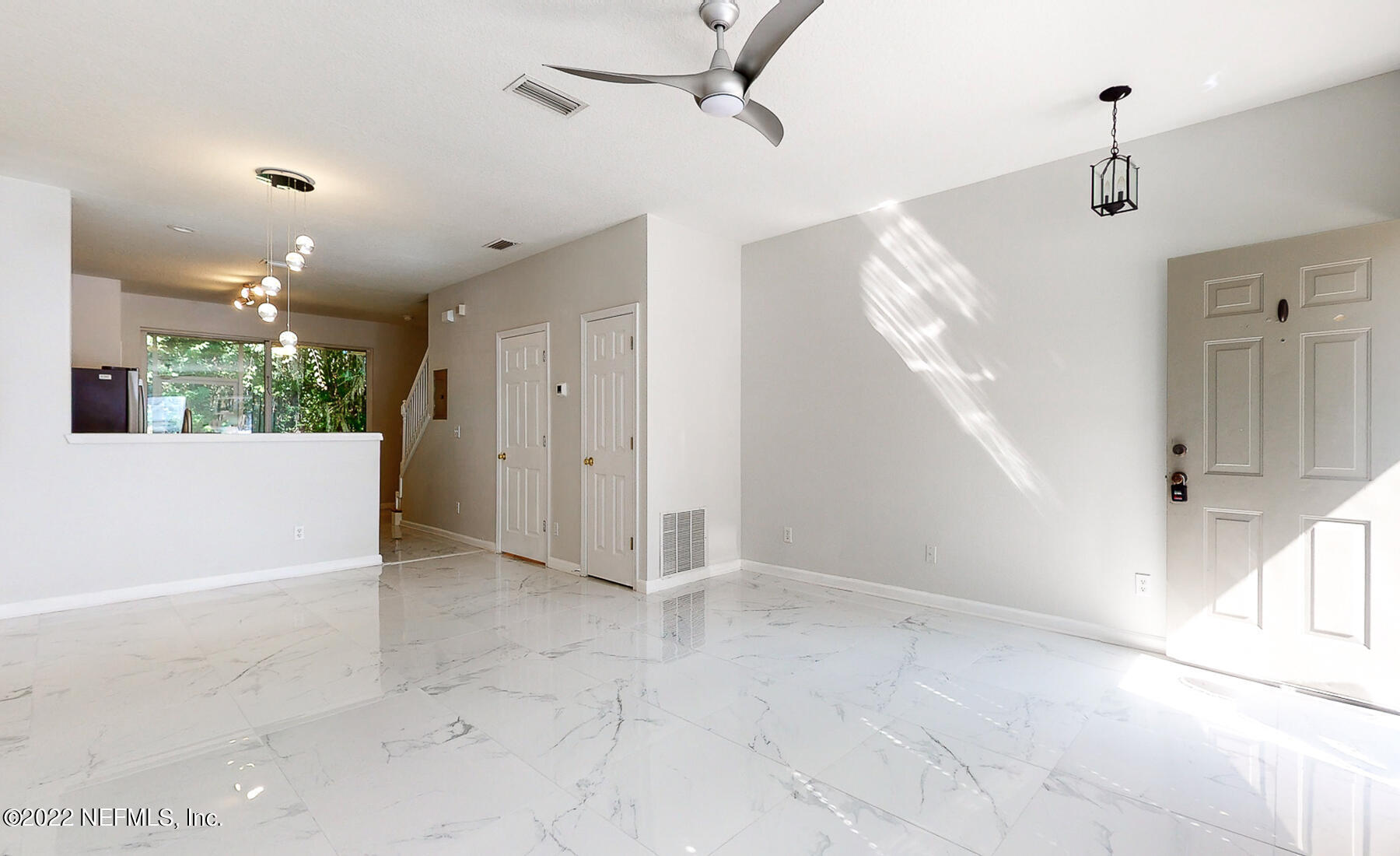 3526 Twisted Tree Lane Jacksonville, FL 32216 - Photo 16 of 33 a view of an empty room with a window