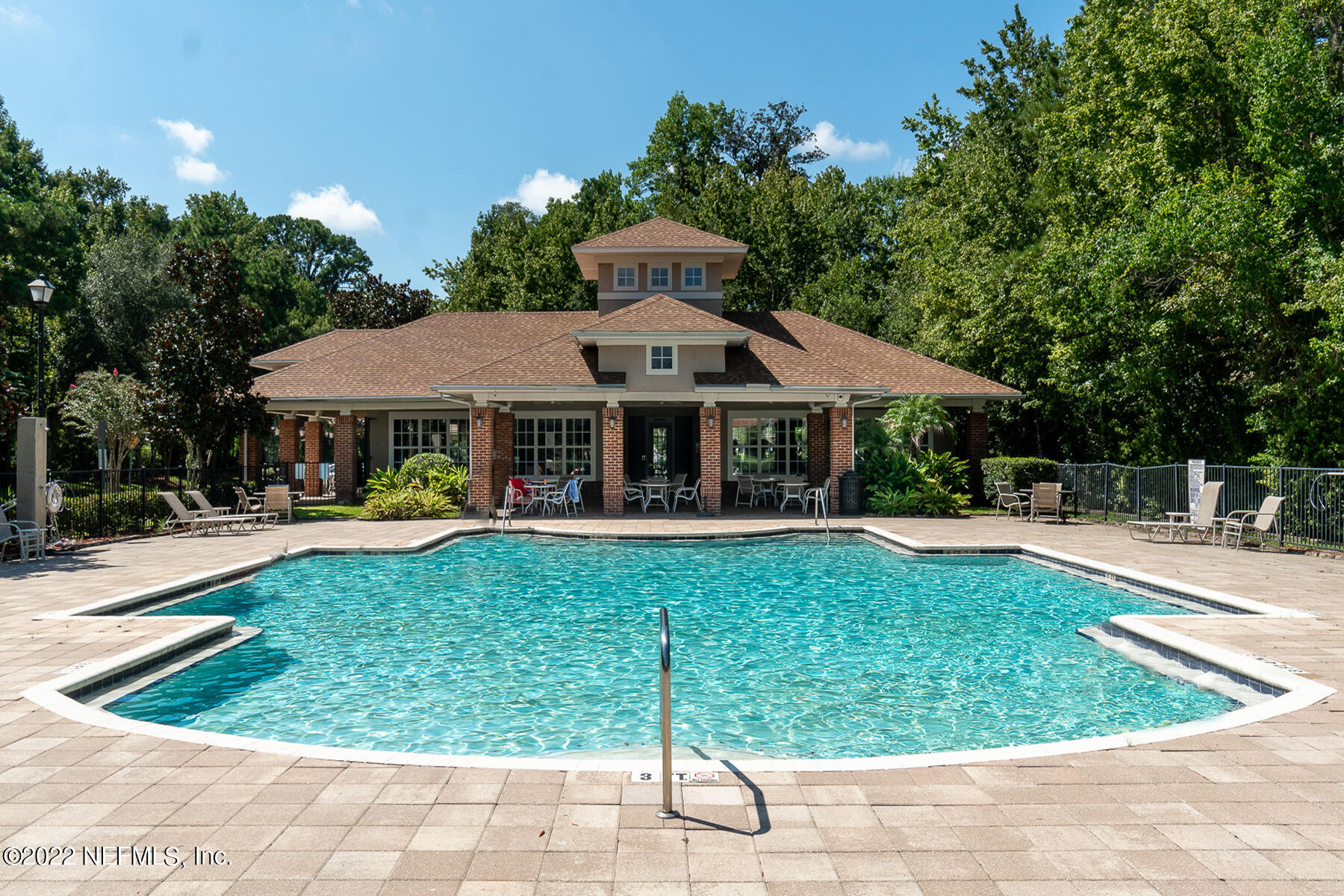 3526 Twisted Tree Lane Jacksonville, FL 32216 - Photo 18 of 33 a front view of a house with garden