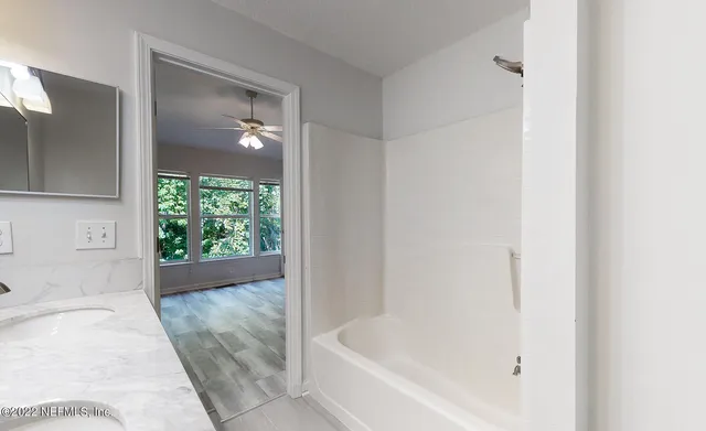 a bathroom with a bathtub