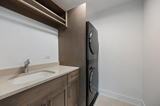 a bathroom with a sink and mirror