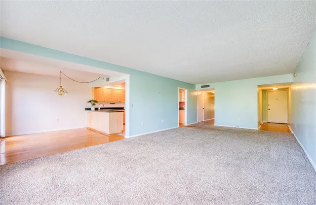 a view of a kitchen with a staircase