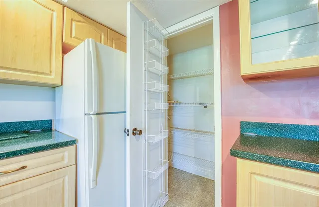 a view of an empty walk in closet