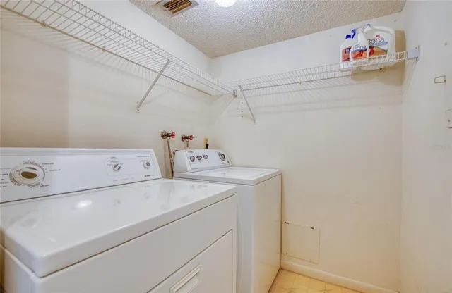 a living room with furniture and natural light