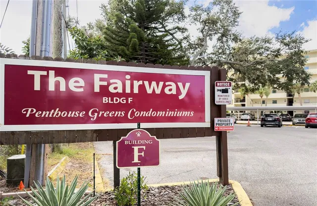 a house with a lot of flower plants