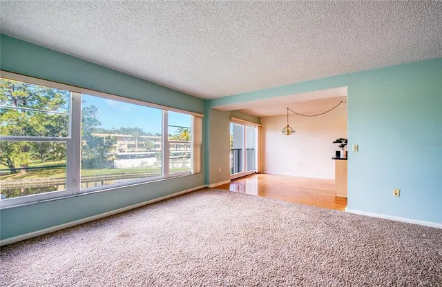 an empty room with windows