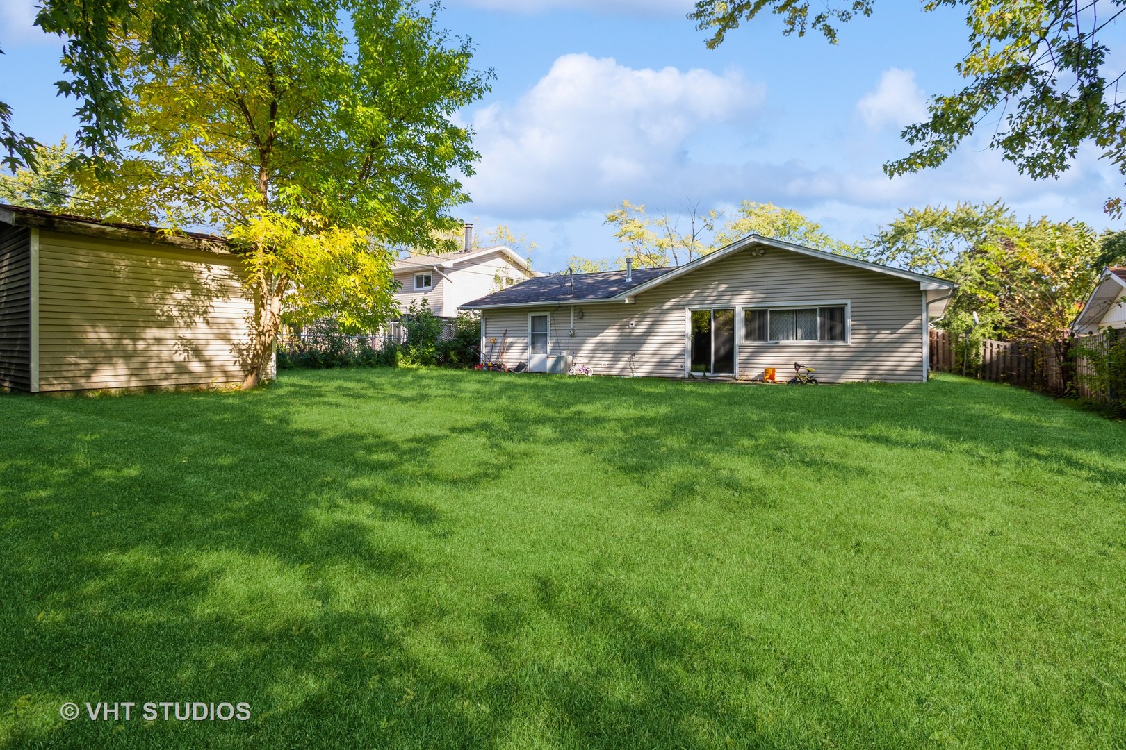 1710 Pierce Road Hoffman Estates, IL 60169 - Photo 11 of 12 a view of a house with a yard