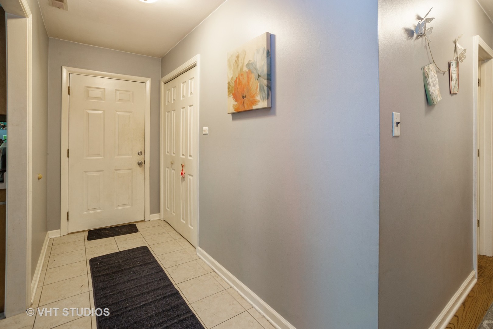 1710 Pierce Road Hoffman Estates, IL 60169 - Photo 2 of 12 a view of hallway with wooden floor