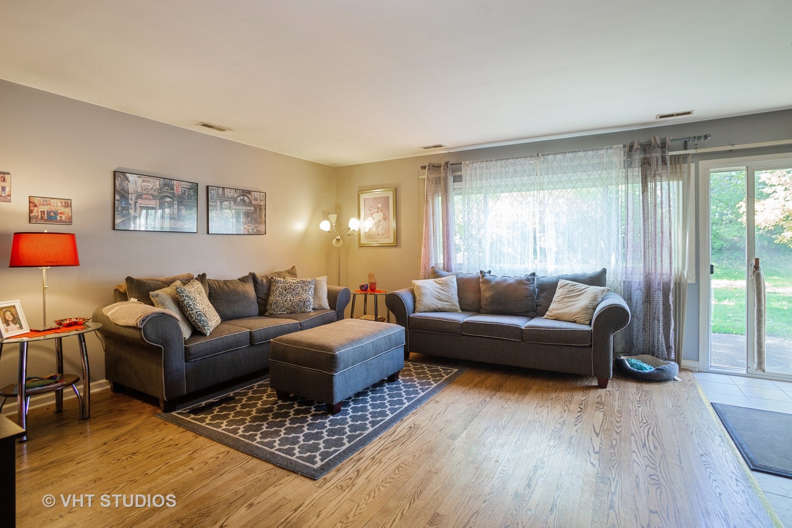 1710 Pierce Road Hoffman Estates, IL 60169 - Photo 3 of 12 a living room with furniture and a wooden floor