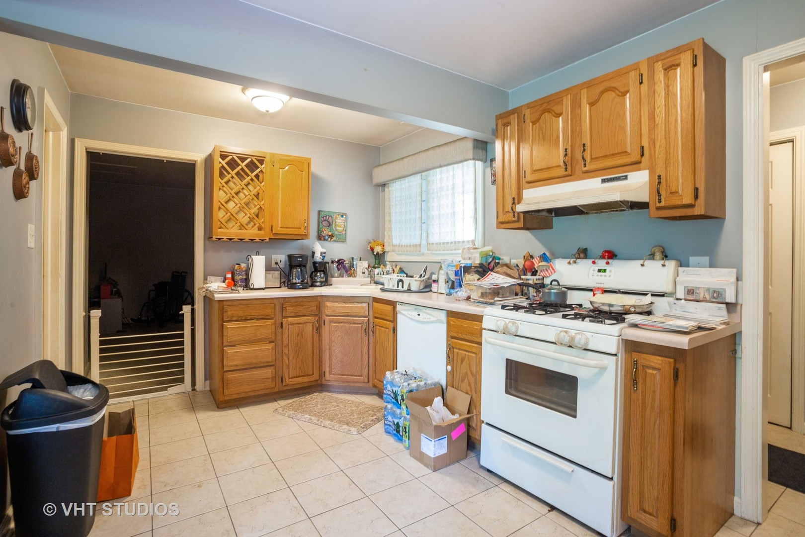 1710 Pierce Road Hoffman Estates, IL 60169 - Photo 5 of 12 a kitchen with a sink stove and cabinets