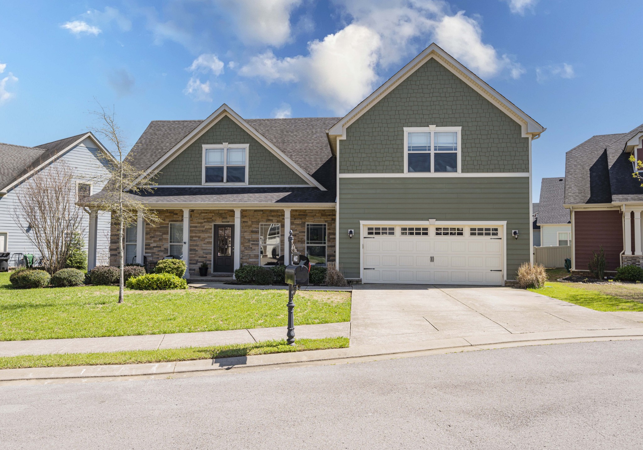 4413 Maximillion Circle Murfreesboro, TN 37128 - Photo 1 of 57 a view of a house with a yard and porch